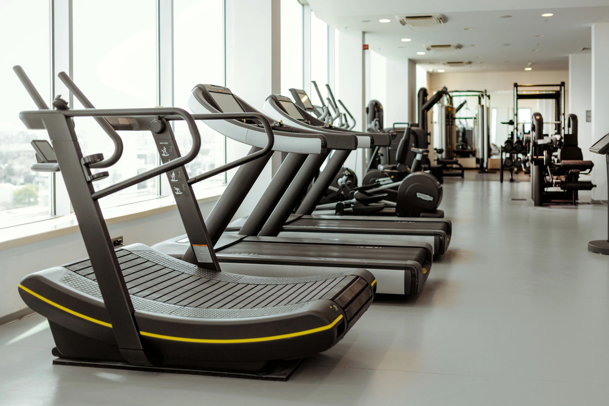 Professional gym facility with durable flooring and training equipment