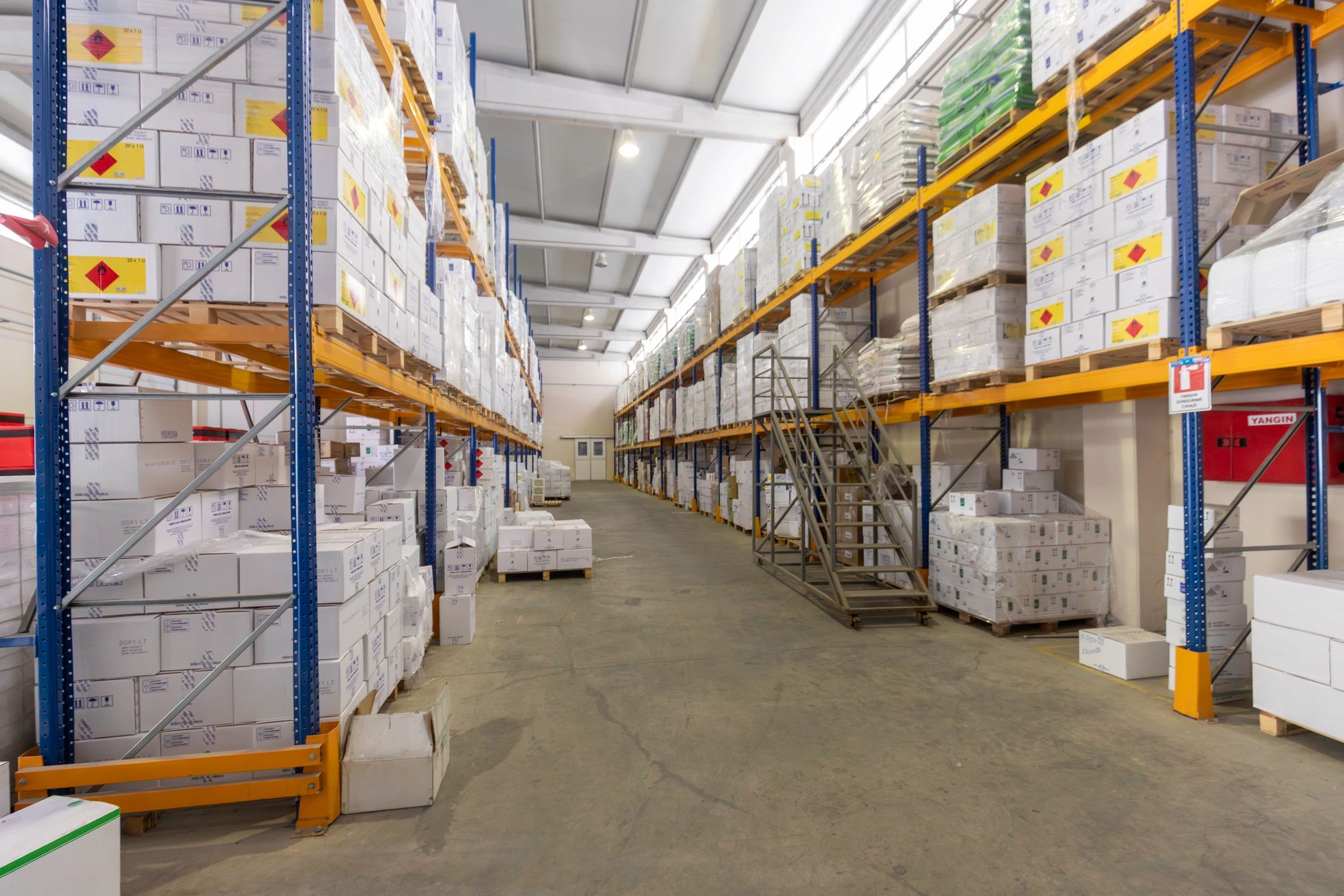 Warehouse aisle representing industrial flooring applications