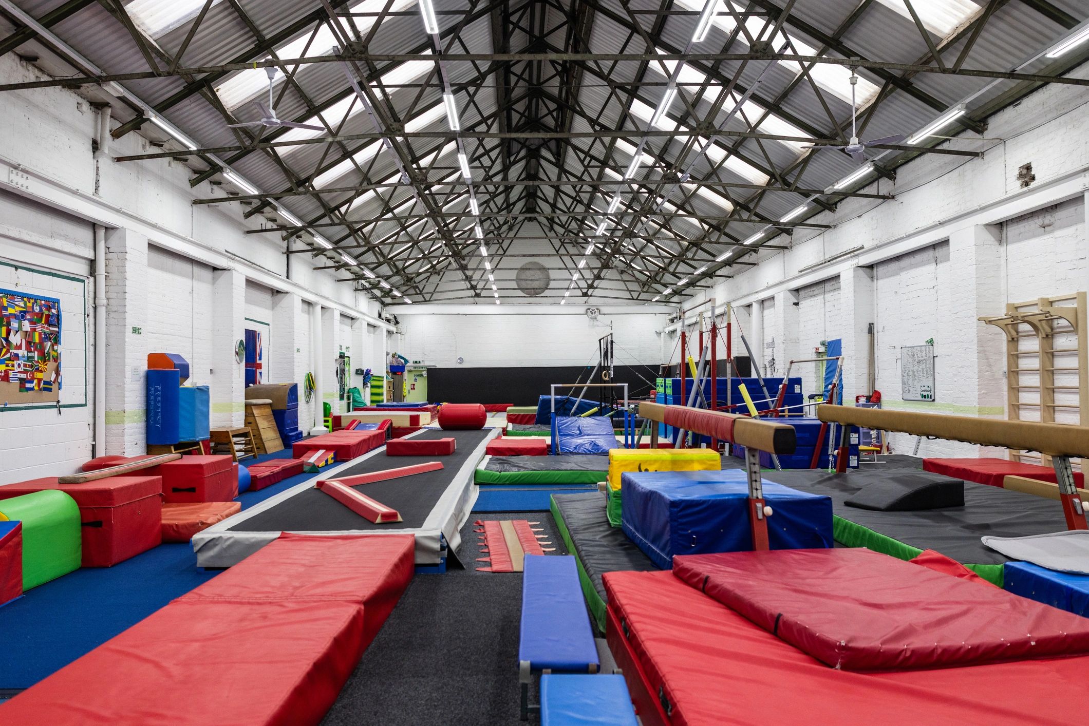 Athletic training facility with colorful mat equipment